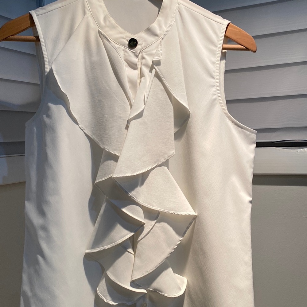 White frill shirt.